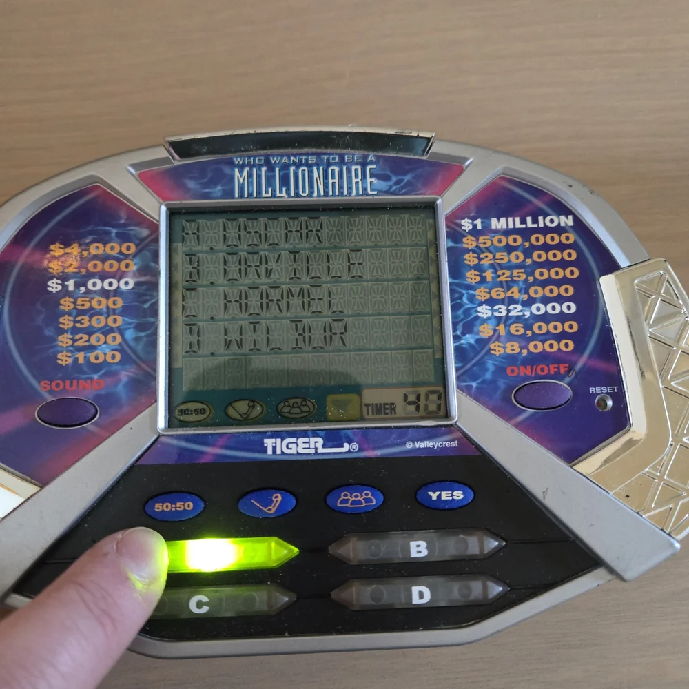 Vtg Who Wants To Be A Millionaire Handheld Electronic LCD Tiger Game Tested Work